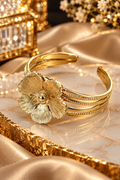 Golden Bloom Sculptural Cuff
A Statement of Timeless Elegance.